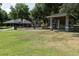 Community park featuring covered picnic area, playground, green space, and recreation opportunities at 131 Wimbledon Cir, Lake Mary, FL 32746