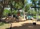 A vibrant playground with various climbing structures, slides, and swings for enjoyment at 131 Wimbledon Cir, Lake Mary, FL 32746