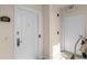 Unit entrance featuring a secure door, unit number, and modern lock system at 1322 Seven Eagles Ct # 301, Reunion, FL 34747