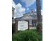 Informative sign showing valet parking, clubhouse, bag drop, and guest parking at Reunion Grande at 1322 Seven Eagles Ct # 301, Reunion, FL 34747