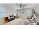 Spacious living room with modern decor, wood flooring, and plenty of natural light at 13241 Cormack Ln, Orlando, FL 32827