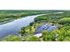 Scenic marina on the water is adjacent to a verdant, lush community with nearby pool and covered picnic areas at 133 Moss Dr, Debary, FL 32713