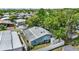 Aerial view showing the home, the yard, and other homes nearby at 133 Moss Dr, Debary, FL 32713