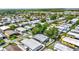 Expansive view of a vibrant residential community featuring numerous single-story homes with well-kept lawns at 133 Moss Dr, Debary, FL 32713