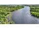 Scenic view of a river surrounded by lush green trees at 133 Moss Dr, Debary, FL 32713