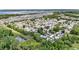 Neighborhood view with homes alongside a waterway and green spaces, offering both convenience and natural beauty at 133 Moss Dr, Debary, FL 32713