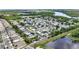 An established neighborhood is nestled beside newer homes, both alongside green spaces and waterfront areas at 133 Moss Dr, Debary, FL 32713