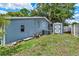 The backyard has a storage shed for extra storage at 133 Moss Dr, Debary, FL 32713