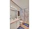 Cozy bathroom featuring a shower, vanity, and towel rack at 133 Moss Dr, Debary, FL 32713