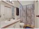 Bathroom with a shower, vanity, and towel rack at 133 Moss Dr, Debary, FL 32713