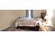 Spacious bedroom with neutral tones and a comfortable bed at 133 Moss Dr, Debary, FL 32713
