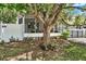 Charming home surrounded by mature trees, offering shade and curb appeal at 133 Moss Dr, Debary, FL 32713