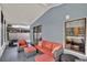 Cozy screened porch with comfortable seating, ideal for relaxing and enjoying the outdoors at 133 Moss Dr, Debary, FL 32713