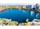 Scenic aerial view of a serene lake and city skyline at 150 E Robinson St # 4A, Orlando, FL 32801