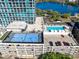 Stunning aerial view of community amenities, including a pool, basketball court and parking at 150 E Robinson St # 4A, Orlando, FL 32801