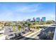 Balcony view with green bike lanes, parking, and a distant city skyline at 150 E Robinson St # 4A, Orlando, FL 32801