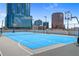 Rooftop basketball court offering stunning views of the city skyline at 150 E Robinson St # 4A, Orlando, FL 32801