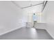 Spacious loft area with a large window, bright lighting, and open floor plan at 150 E Robinson St # 4A, Orlando, FL 32801