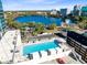 Rooftop pool deck overlooking a lake, offering an urban oasis at 150 E Robinson St # 4A, Orlando, FL 32801