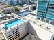 Beautiful rooftop pool and tennis court with city views in this modern building at 150 E Robinson St # 4A, Orlando, FL 32801