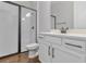 Bathroom boasts a glass shower and modern vanity at 16753 Gullfloss Ter, Winter Garden, FL 34787