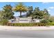 Community entrance sign with decorative stone, water features and manicured landscaping at 16753 Gullfloss Ter, Winter Garden, FL 34787