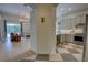 Stylish kitchen with light gray cabinets, stainless steel appliances, and eye-catching tile flooring at 1740 Cherry Ridge Dr, Lake Mary, FL 32746