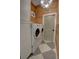 Modern laundry room with side-by-side washer and dryer at 1740 Cherry Ridge Dr, Lake Mary, FL 32746