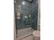 Elegant glass shower featuring stylish tile and modern fixtures at 1740 Cherry Ridge Dr, Lake Mary, FL 32746