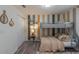 Cozy ' bedroom features a bunk bed, and soft lighting, creating a delightful space at 2004 Fleming Mist Pl, Kissimmee, FL 34747