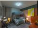Comfortable bunk bed bedroom with desk, chair and colorful decorations at 2004 Fleming Mist Pl, Kissimmee, FL 34747