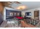 Fun-filled game room with a pool table, foosball table, and custom ceiling accents for entertainment at 2004 Fleming Mist Pl, Kissimmee, FL 34747
