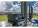 Outdoor grilling area featuring a modern stainless steel grill perfect for entertaining at 2004 Fleming Mist Pl, Kissimmee, FL 34747