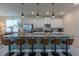 Stunning kitchen featuring a large center island with seating and stainless steel appliances at 2004 Fleming Mist Pl, Kissimmee, FL 34747