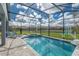 Relaxing pool area with inviting lounge chairs and a sparkling inground pool and spa at 2004 Fleming Mist Pl, Kissimmee, FL 34747
