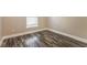 Inviting bedroom space, illuminated by natural light and featuring wood flooring at 2081 Galveston Ave, Deltona, FL 32725