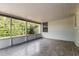 Covered screened-in patio for outdoor seating and entertaining at 2081 Galveston Ave, Deltona, FL 32725