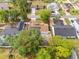 A lovely suburban home has solar panels and a spacious yard surrounded by mature trees at 211 Dalton Dr, Kissimmee, FL 34758