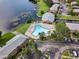 Aerial view of the community pool by the lake at 222 Georgetown Dr # C, Casselberry, FL 32707