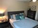 Cozy bedroom featuring a comfortable bed with stylish pillows and a ceiling fan for added comfort at 222 Georgetown Dr # C, Casselberry, FL 32707