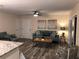 Cozy living room with comfortable seating, stylish decor, and easy access to the kitchen area, perfect for relaxing and entertaining at 222 Georgetown Dr # C, Casselberry, FL 32707