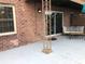 Patio with furniture and a view of the brick exterior of the home at 222 Georgetown Dr # C, Casselberry, FL 32707