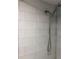 A closer look at a detailed shower with clean tiling and a shower head at 222 Georgetown Dr # C, Casselberry, FL 32707