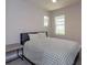 Bright bedroom with plenty of natural light and tiled floors for easy maintenance at 2285 Mystic Maze Ln, Clermont, FL 34715