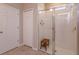 Modern walk-in shower with built-in niche and a teak stool at 2285 Mystic Maze Ln, Clermont, FL 34715