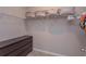 Spacious walk-in closet features custom shelving and ample storage space, perfect for organization at 2285 Mystic Maze Ln, Clermont, FL 34715