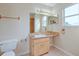 Bathroom with vanity featuring a mirror and tile countertop at 2516 Albury Ave, Deltona, FL 32738