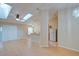 Bright and open living and dining area featuring laminate floors and direct access to the kitchen at 2516 Albury Ave, Deltona, FL 32738