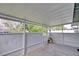 Enclosed patio offering natural light and views of the surrounding area at 2516 Albury Ave, Deltona, FL 32738