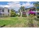 Backyard with well maintained lawn and landscaping at 264 Balfour Dr, Winter Park, FL 32792